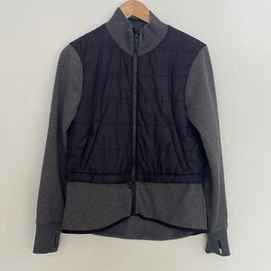 Athleta black and grey layered XS zip jacket with zip pockets and thumb holes